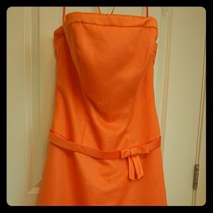Orange bridesmaid dress. New without tags.